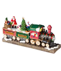 Boutique de Noël Animated And Musical Pieces*Table Ornament, Musical Train, With Santa And Elves. Measures 15 Inches.