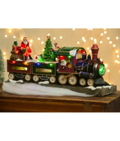 Boutique de Noël Santa'S Workshop*Table Ornament, Musical Train, With Santa And Elves. Measures 15 Inches.