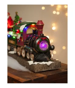 Boutique de Noël Winter Wonderland*Table Ornament, Musical Train, With Santa And Elves. Measures 15 Inches.